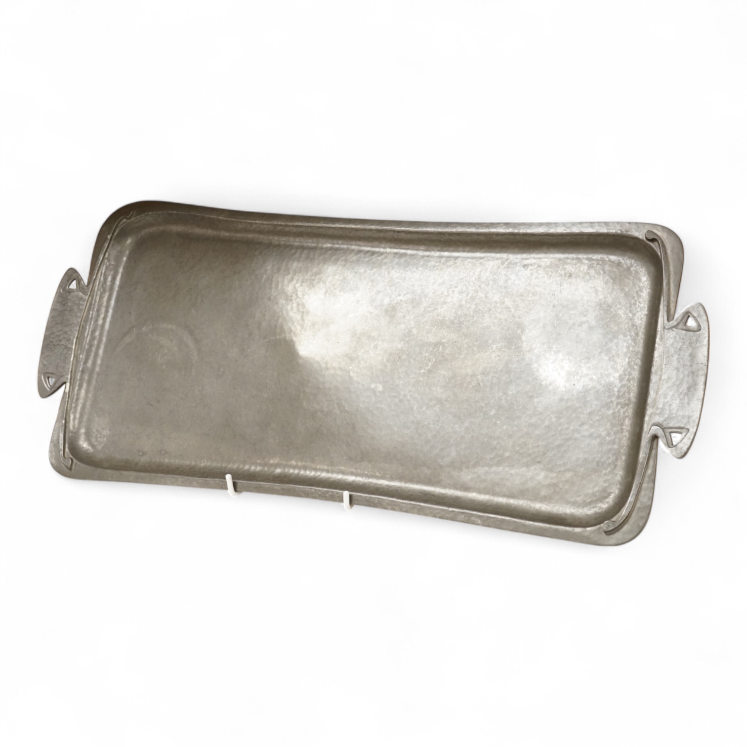 An Art Nouveau Liberty Tudric rectangular pewter tray, stamped and numbered 01671 to the base, 50cm wide
